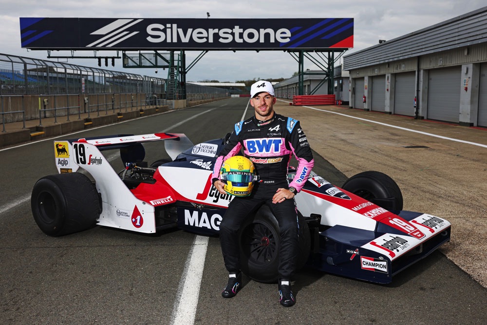 Pieere Gasly sits on Ayrton Senna's fiirst F1 car , the 1984 Toleman TG183B